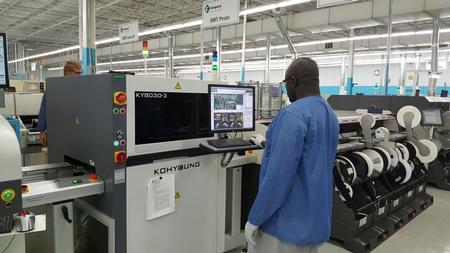 SMT Operator Richard Aggrey operating the new KY-8030-3s.